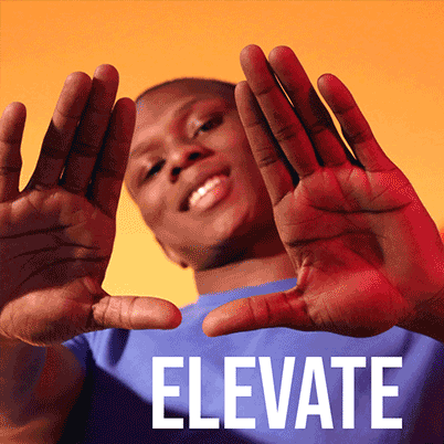 young man looking at viewer through his hands